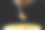 微距照片的甜点勺子与焦糖冰淇淋在一个冰淇淋容器前面的黑色背景与复制空间。图片下载