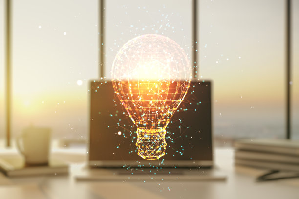 创意灯泡全息图在现代笔记本电脑的背景，想法概念。Multiexposure图片下载