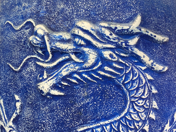 蓝色背景浮雕中国龙图片下载