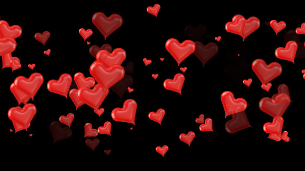 在黑色背景上放飞的心气球图片下载