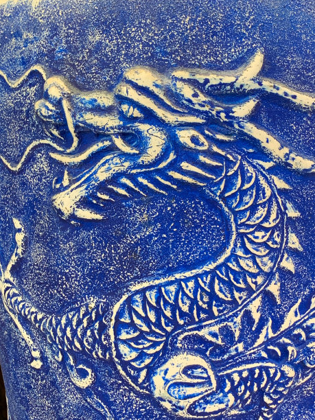 蓝色背景浮雕中国龙图片下载