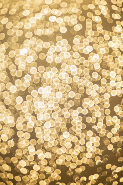 金色散焦闪光，抽象背景与黄色热散焦图片下载