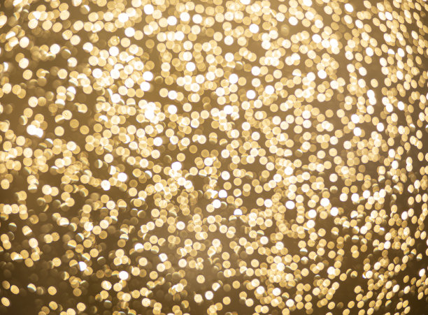 金色散焦闪光，抽象背景与黄色热散焦图片下载