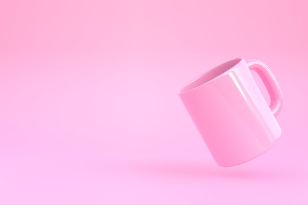 粉红色陶瓷杯或空杯子，咖啡，饮料或茶的粉红色背景图片下载