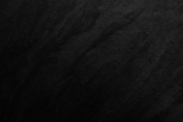 表面黑色石材纹理粗糙梯度叠加，灰黑色调。使用这个墙纸或背景图像。有一个空白的文本空间。“t图片下载