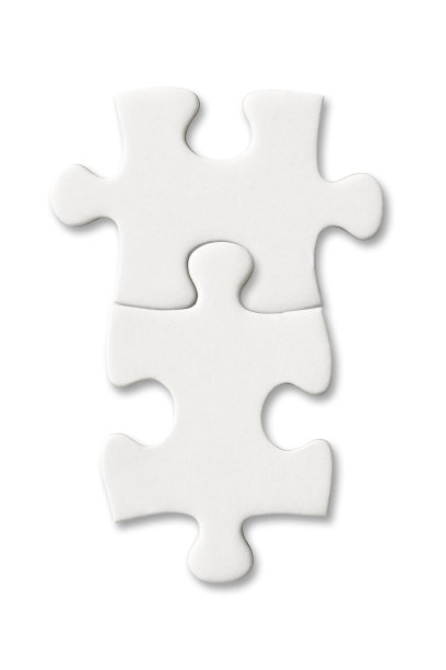 白色背景上的拼图碎片的孤立镜头图片下载