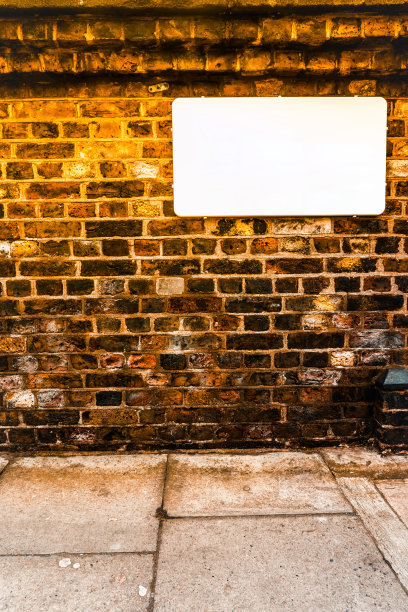 砖墙上空白的白色标志图片下载