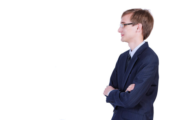 公司经理双手交叉放在胸前，站在那里，对自己的能力充满信心图片下载