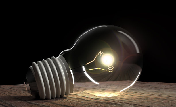 一个灯泡在一个旧的木制桌子上与黑暗的气氛和镜头光晕效果的3d渲染插图图片下载