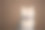 调皮的猫伸出舌头在棕色的背景与拷贝空间图片下载
