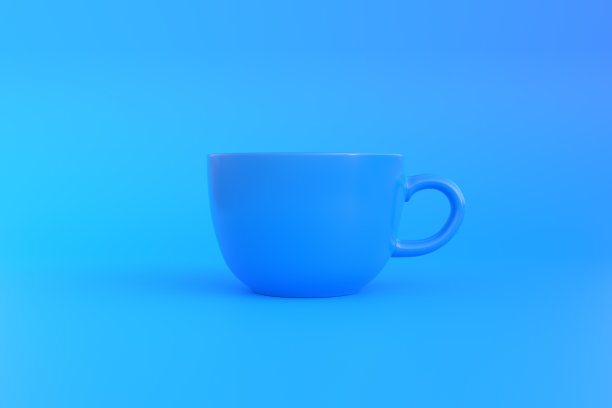 蓝色背景上的蓝色陶瓷咖啡杯图片下载