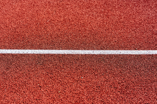 红色田径跑道的纹理与白线图片下载