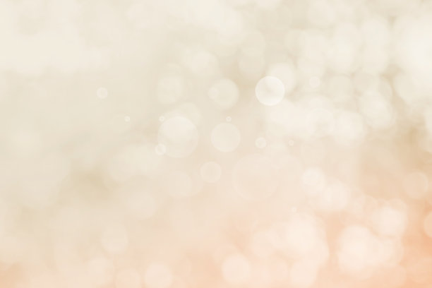 摘要模糊的奶油色为背景，模糊的节日灯光为室外庆祝活动和白色散景聚焦纹理装饰设计优雅的赢家。图片下载