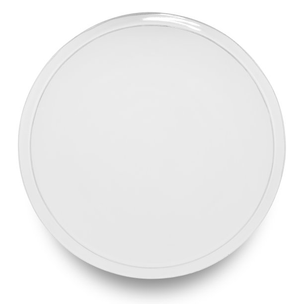 白色背景上孤立的白色圆形陶瓷板。图片下载