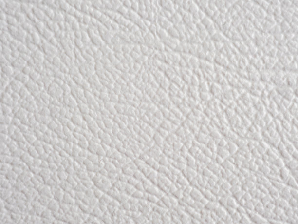 白色皮革的背景。皮革的背景。图片下载