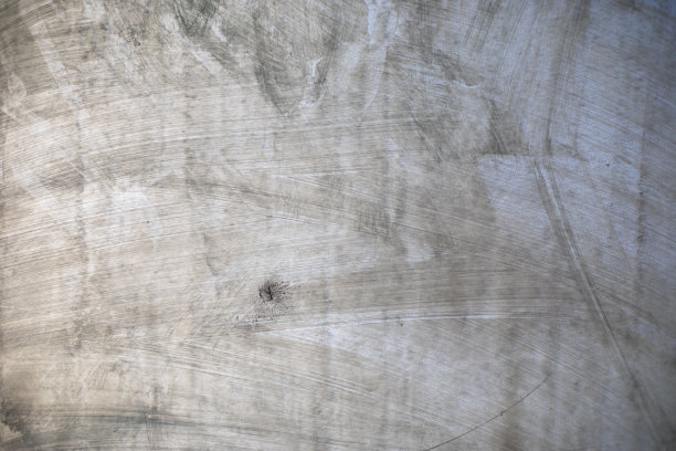 肮脏的表面。挠塑料。墙上有泥土的痕迹。图片下载