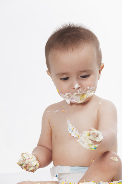 漂亮的宝宝在照相馆拍他第一年的照片图片下载