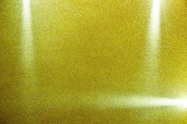 金色颗粒状背景上的三束光图片下载