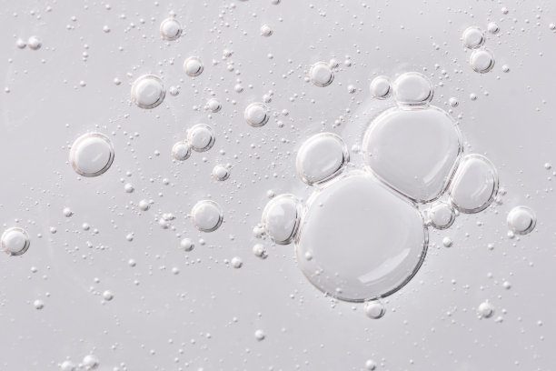 透明的凝胶质地。含气泡的油脂精华质地。图片下载