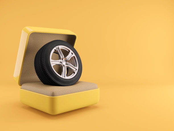 轮胎和合金轮辋在环盒与黄色背景。三维渲染图片下载