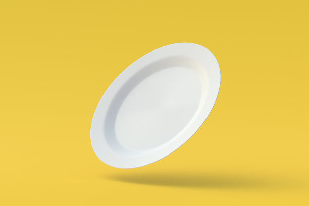 白色的盘子上黄色的背景。三维渲染图片下载