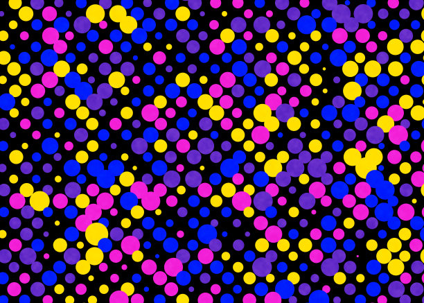 黑色背景上的彩色圆点图片下载