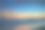 数码绘画的海洋在黄金时间，当黎明开始打破白色的沙滩。图片下载
