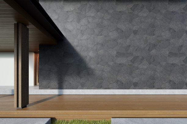现代建筑的3d渲染与大型石材覆盖墙和木制露台。图片下载