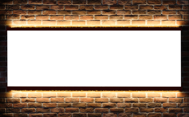 用LED灯在砖墙上模拟广告牌。一个内部空信息广告牌的模板，一个横幅占位符和海报的模型。图片下载