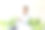 商业肖像的环境工程师坐在他的工作桌上，手里拿着一个风力涡轮机模型图片下载