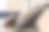 美容室的床上铺着干净的白色枕头和床单。特写镜头。镜头在阳光下的天赋。新床被与装饰枕头，床头板在卧室在家里分期特写图片下载