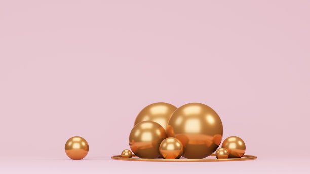 金色球体在粉红色的背景图片下载