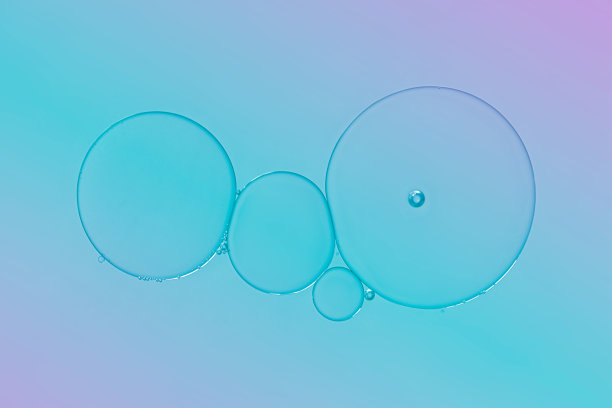 油斑点图案背景。图片下载