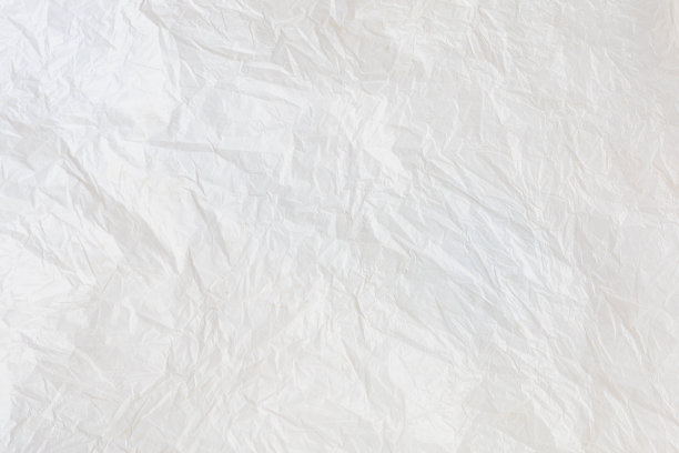 纹理皱巴巴的塑料包装袋背景。背景图片下载