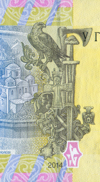 乌克兰钞票上的鹰、十字和武器徽章图案设计图片下载
