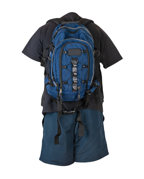 背包，运动短裤，t恤都放在白色的垫子上。每天穿的衣服图片下载