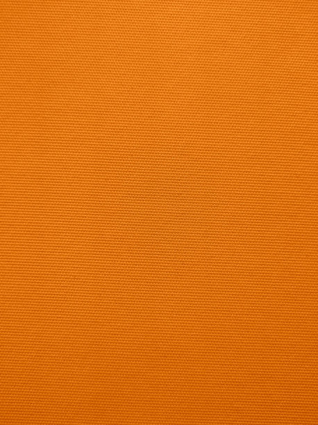 橙色织物纹理为背景，复制空间为设计图片下载