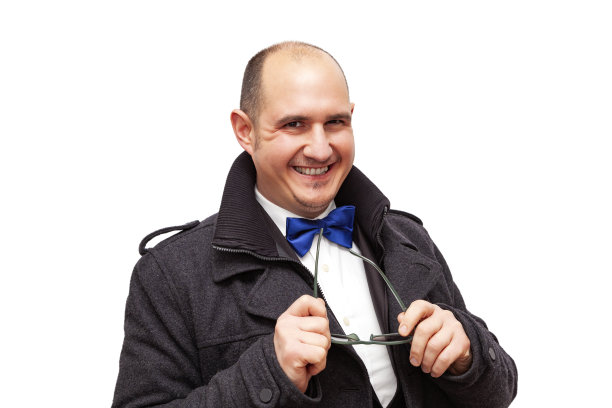 拿着太阳镜的穿着讲究的秃头男人图片下载