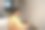 东南亚男子斜靠在床上，姿势不佳，在笔记本电脑上打字图片下载