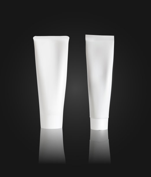 在黑色背景上的奶油管模型。管包装模型。矢量图图片下载