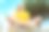 十几岁的女孩戴着耳机坐在公园的户外，蓝天白云图片下载
