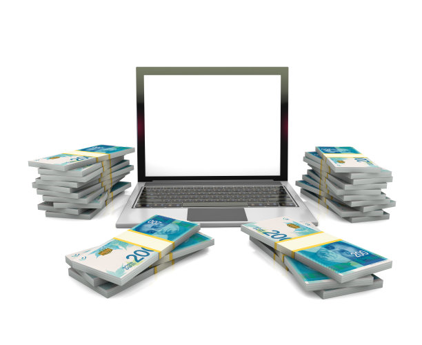 笔记本电脑和谢克尔钞票图片下载