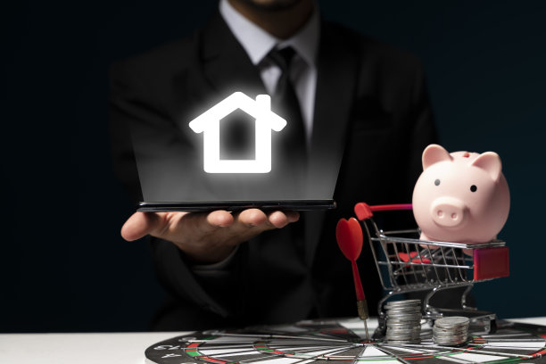 手持智能手机设备与房屋图标上面图片下载