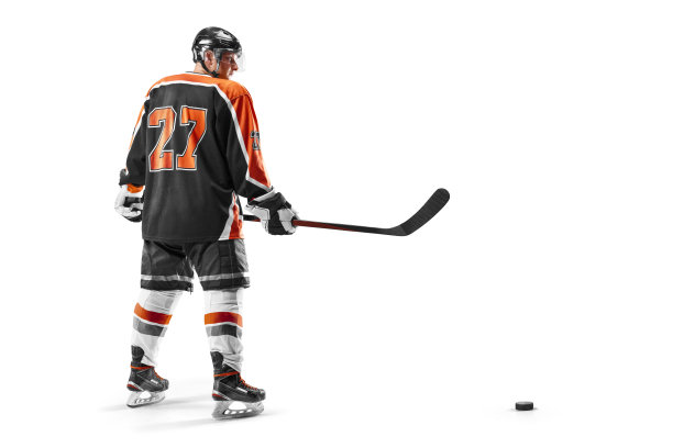 曲棍球。体育的概念。职业曲棍球运动员孤立在白色背景。运动员。视图从后面图片下载