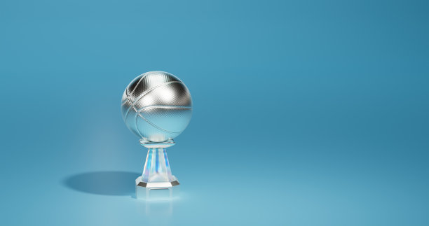 明亮的篮球银杯与柔和的灯光背景图片下载