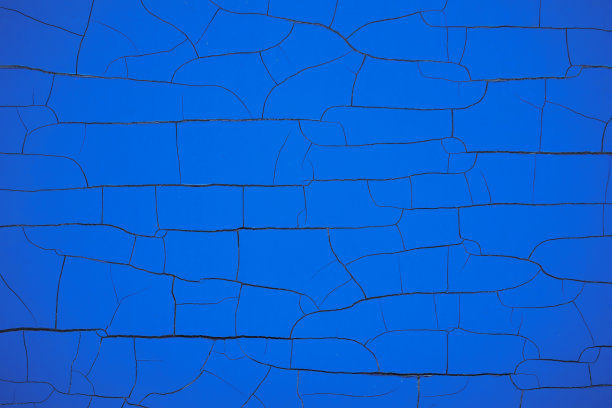 墙壁背景上的裂缝，裂缝。蓝色墙壁，油漆剥落图片下载