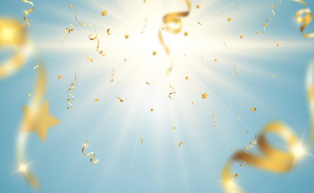 金色的彩纸落在美丽的背景上。舞台上落下的飘带。图片下载