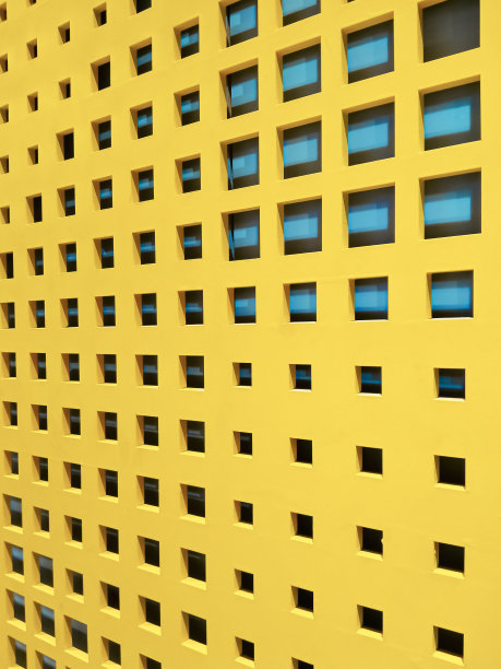 摘要背景矩形图案与蓝色光反射黄色墙壁装饰在透视侧视图图片下载