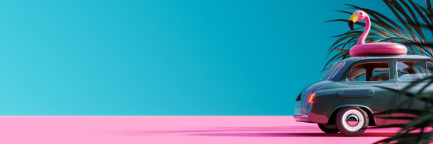 绿色复古汽车与粉红色的火烈鸟充气在屋顶和棕榈树在蓝色的背景图片下载