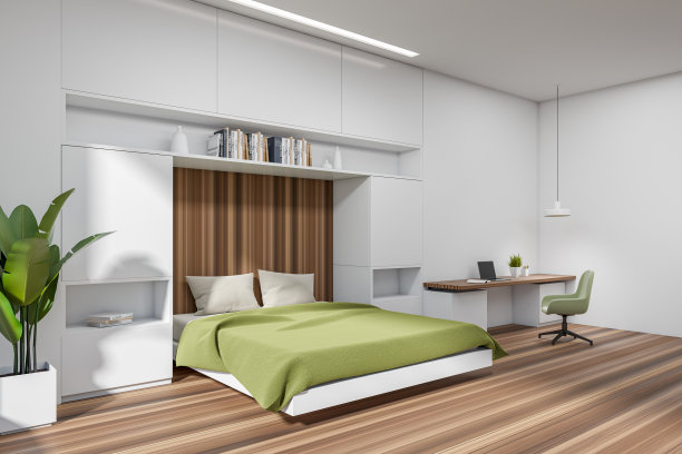 明亮的卧室内部有床和书，工作空间有电脑图片下载